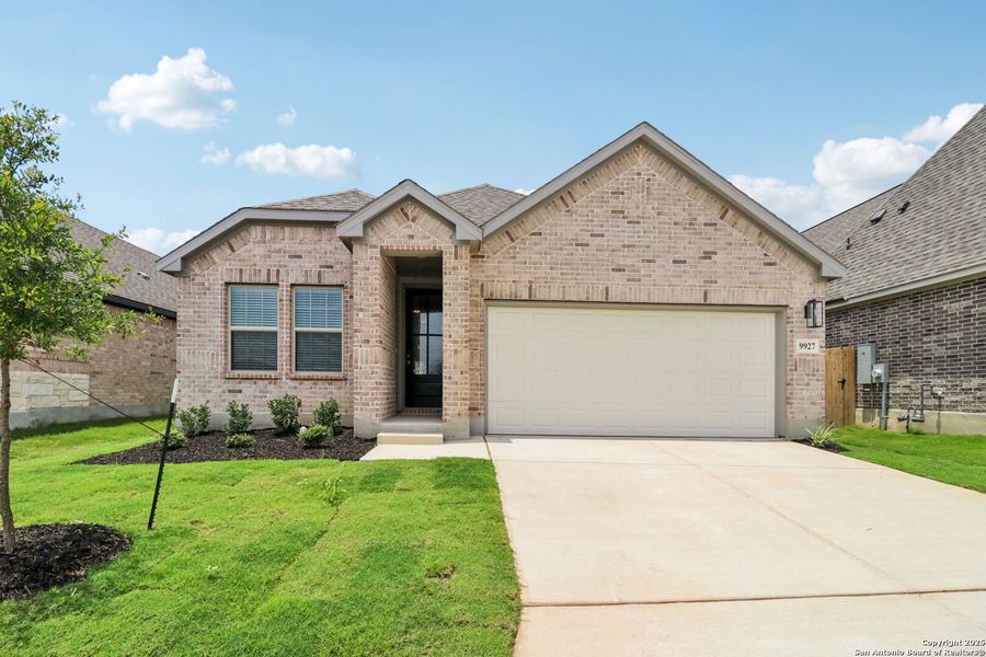 Front exterior of a home in the Kallison Ranch community, located in San Antonio, TX (Image 19).