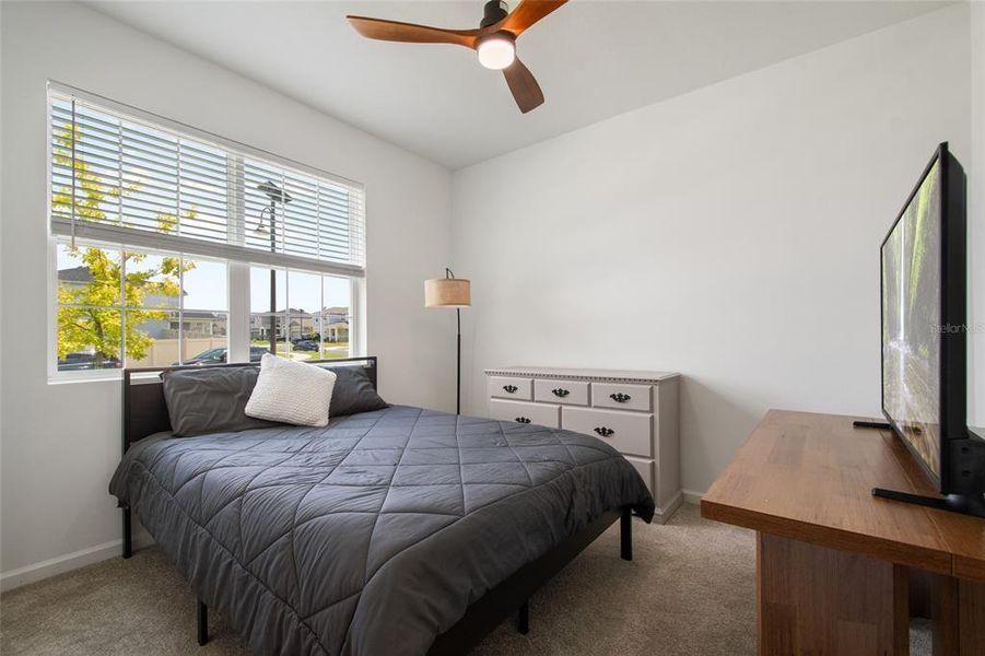 Furnished interior view inside a new home in Waterbrooke, Clermont (Image 39).