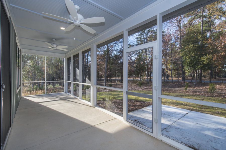 Exterior details and patio area of a home in , Chapin (Image 31).