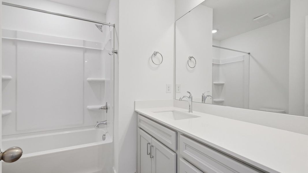 Top-notch bathroom with current fixtures, tasteful materials, and elevated charm in Fountain Inn, SC