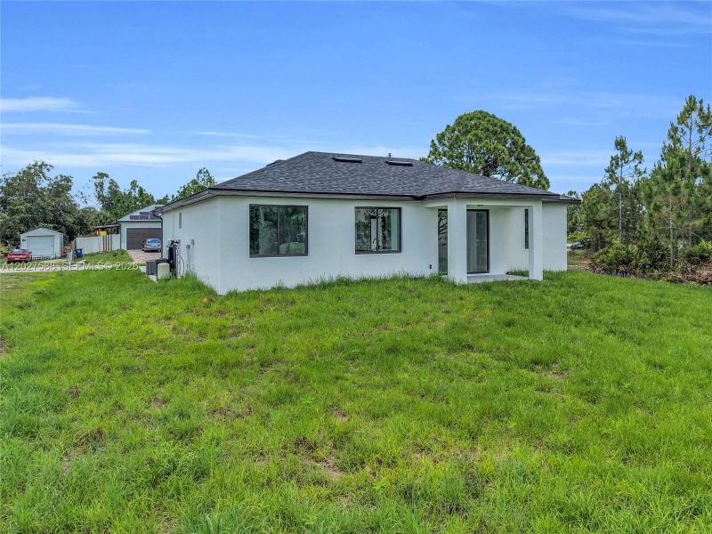 Exterior details and patio area of a home in , Lehigh Acres (Image 26).