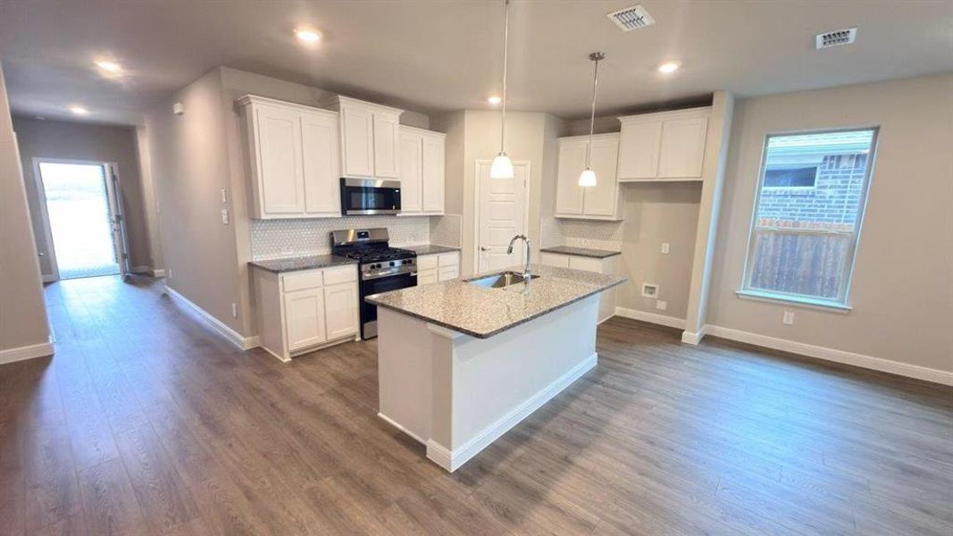Furnished interior view inside a new home in Bluestem, Rhome (Image 9).