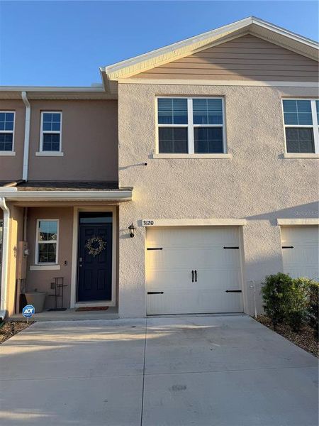 Front exterior of a new home in , Davenport, FL, highlighting curb appeal (Image 23).