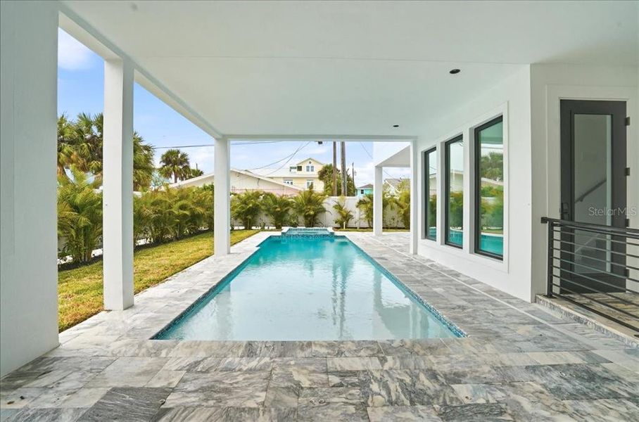 Exterior details and patio area of a home in , Englewood (Image 33).