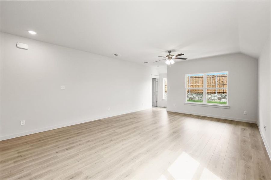 Spare room with ceiling fan, recessed lighting, and light wood-style floors