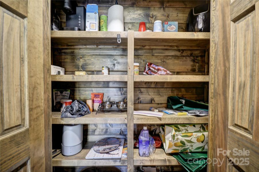 Double-door pantry just off the kitchen