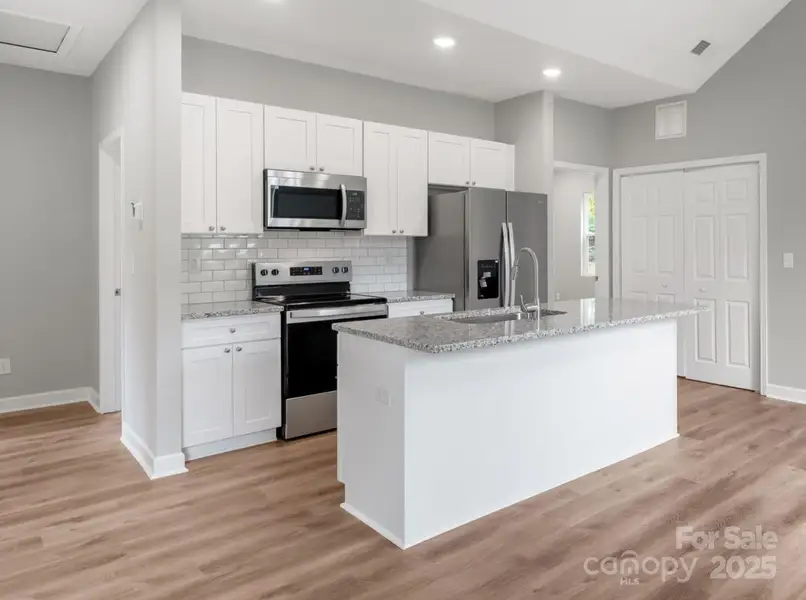 Furnished interior view inside a new home in , East Spencer (Image 10).