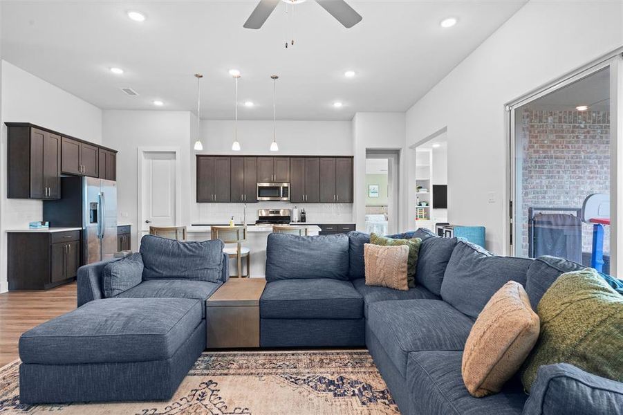 The great room provides ample space for the living room to flow into the kitchen.