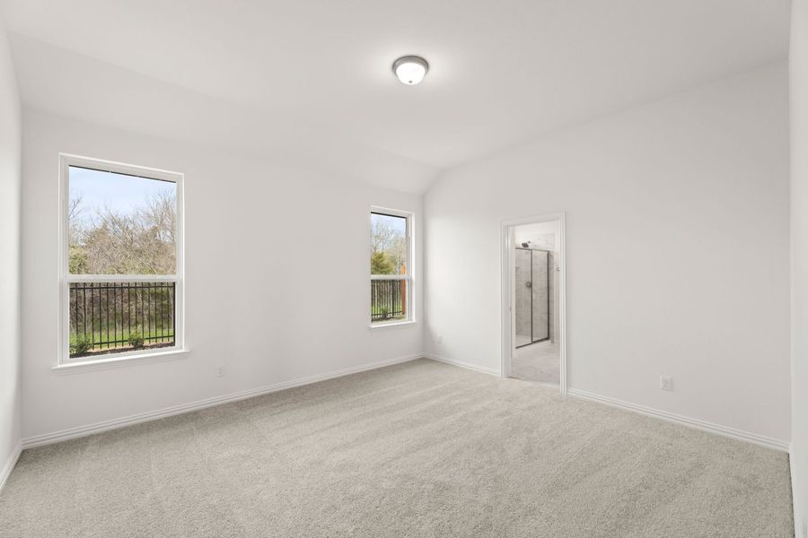 Representative unfurnished interior of a home built from the Blackburn by UnionMain Homes in Reunion, Rhome (Image 22).