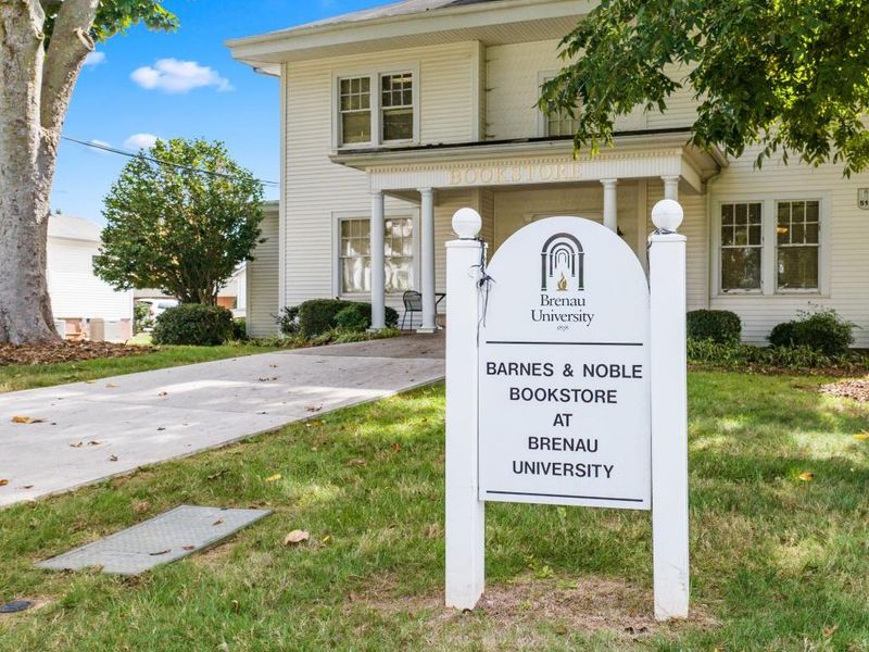 Front exterior of a new home in Falcon Landing, Gainesville, GA, highlighting curb appeal (Image 1).
