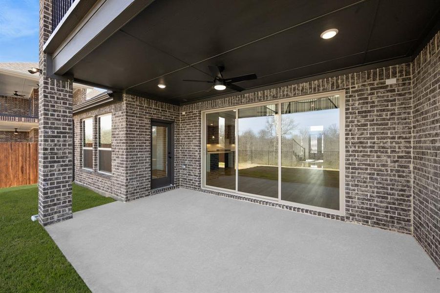 Exterior details and patio area of a home in High Country, Burleson (Image 3).
