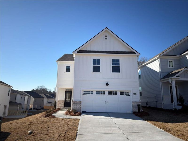 Front exterior of a new home in Mableton Station, Mableton, GA, highlighting curb appeal (Image 1). Front exterior of a new home in Mableton Station, Mableton, GA, highlighting curb appeal (Image 1).
