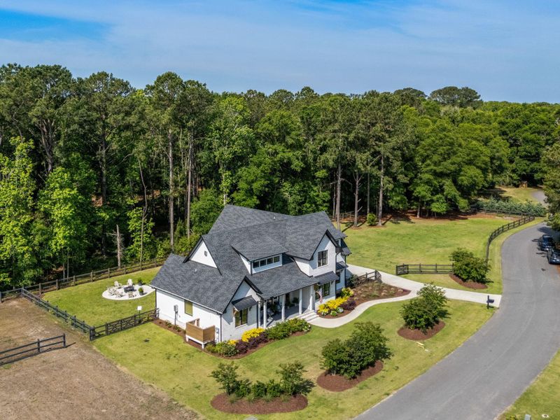 Front exterior of a new home in , Johns Island, SC, highlighting curb appeal (Image 1). Front exterior of a new home in , Johns Island, SC, highlighting curb appeal (Image 1).