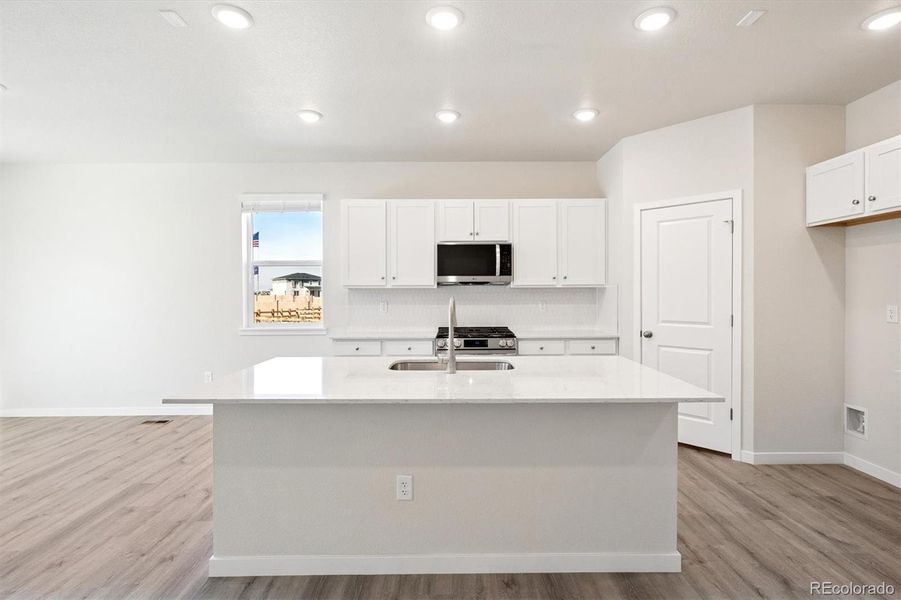 Furnished interior view inside a new home in The Aurora Highlands, Aurora (Image 9).