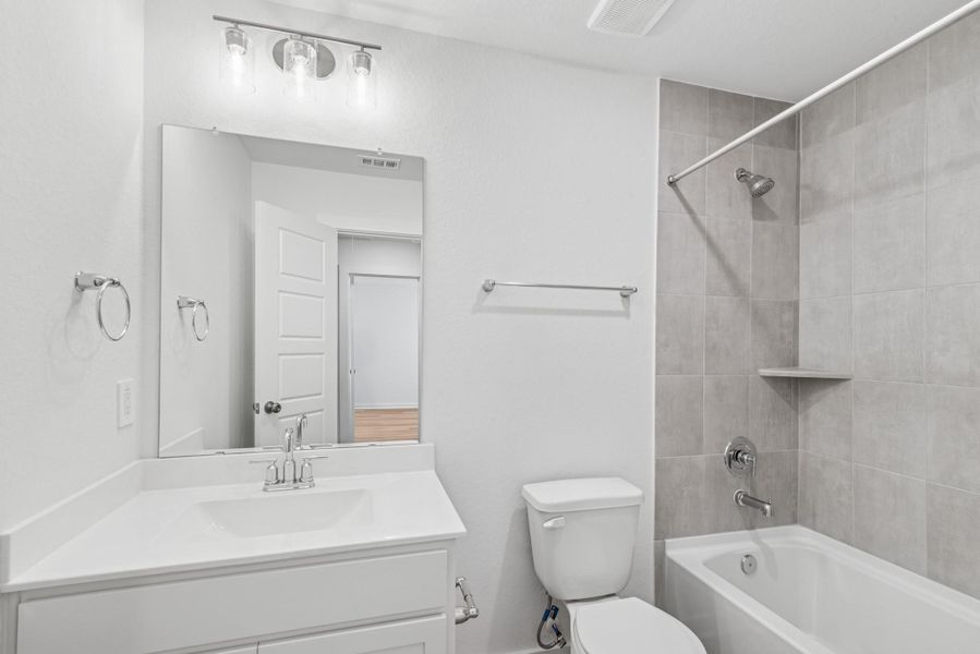 Furnished interior view inside a new home in Pinewood at Grand Texas, New Caney (Image 3).