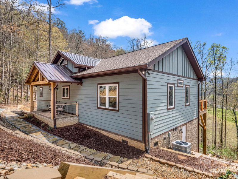 Exterior details and patio area of a home in , Hendersonville (Image 25).