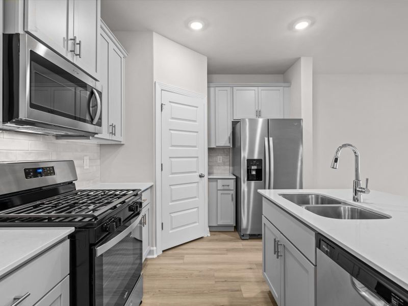 Furnished interior view inside a new home in Crossing at Abner Creek Townes, Greer (Image 7).