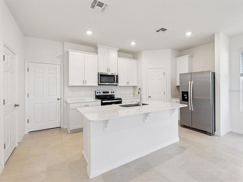 Furnished interior view inside a new home in The Meadow at Crossprairie Bungalows, St. Cloud (Image 4).