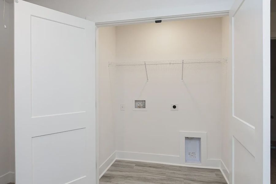 Representative unfurnished interior of a home built from the 1557 Townhome by Adams Homes in Parkstone Place Townhomes, Roebuck (Image 22).