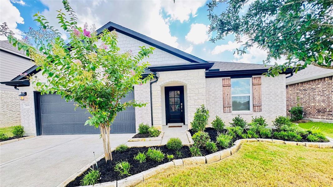 Front exterior of a new home in Southwinds, Baytown, TX, highlighting curb appeal (Image 2). Front exterior of a new home in Southwinds, Baytown, TX, highlighting curb appeal (Image 2).