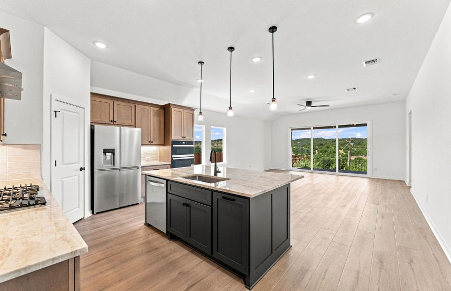 Representative furnished interior of a home built from the Elliott by Pulte Homes in West Cypress Hills, Spicewood (Image 8).