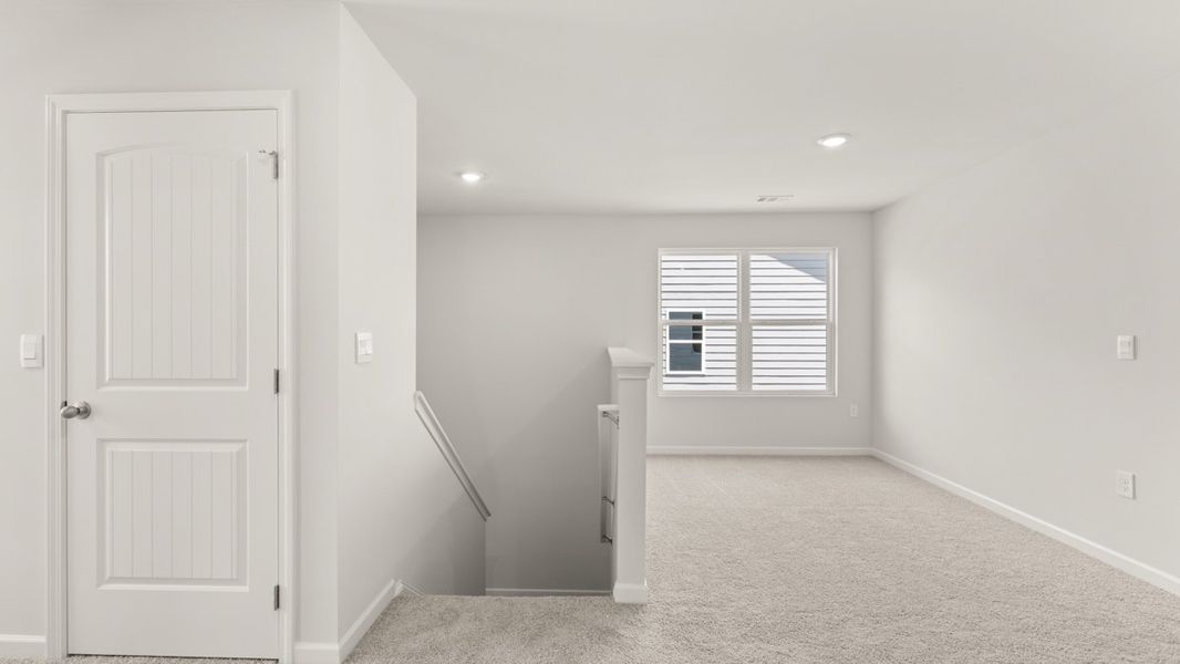 Representative unfurnished interior of a home built from the Irwin ll by D.R. Horton in Braselton Village, Braselton (Image 22).