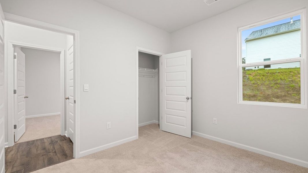 Spacious, unfurnished interior of a new home in Estates at Deer Hollow, Grovetown (Image 20). Spacious, unfurnished interior of a new home in Estates at Deer Hollow, Grovetown (Image 20).