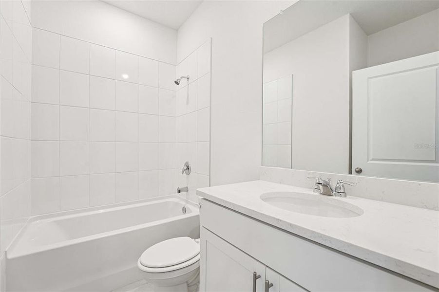 Furnished interior view inside a new home in The Grove at Stuart Crossing - Premier Series, Bartow (Image 9). Furnished interior view inside a new home in The Grove at Stuart Crossing - Premier Series, Bartow (Image 9).