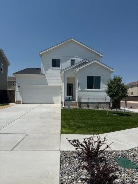 Front exterior of a new home in , Calhan, CO, highlighting curb appeal (Image 1).