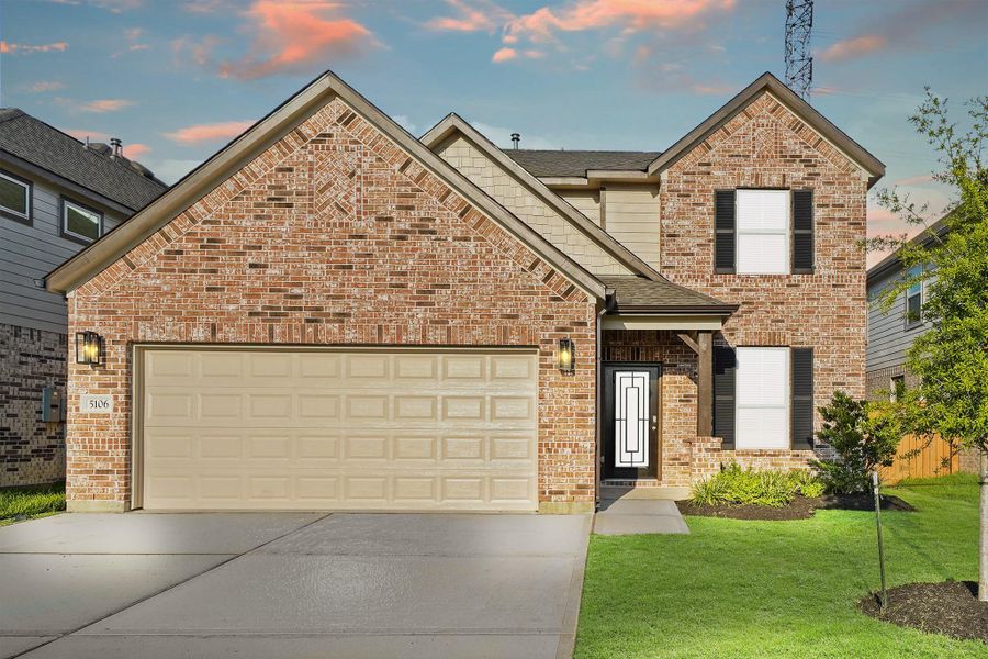 Front exterior of a new home in Sunterra North, Katy, TX, highlighting curb appeal (Image 14). Front exterior of a new home in Sunterra North, Katy, TX, highlighting curb appeal (Image 14).
