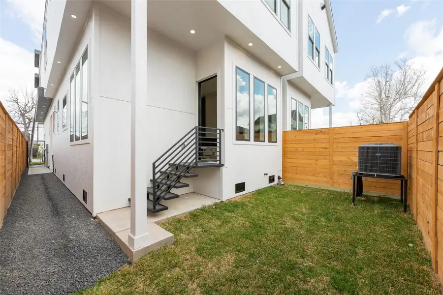 Exterior details and patio area of a home in , Houston (Image 3).