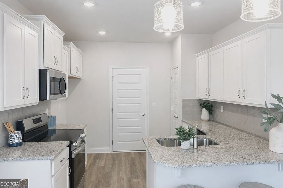Furnished interior view inside a new home in Canterbury Villas, Carrollton (Image 9).