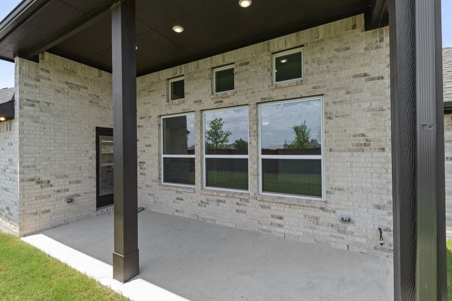 Exterior details and patio area of a home in River Ranch, Van Alstyne (Image 3). Exterior details and patio area of a home in River Ranch, Van Alstyne (Image 3).