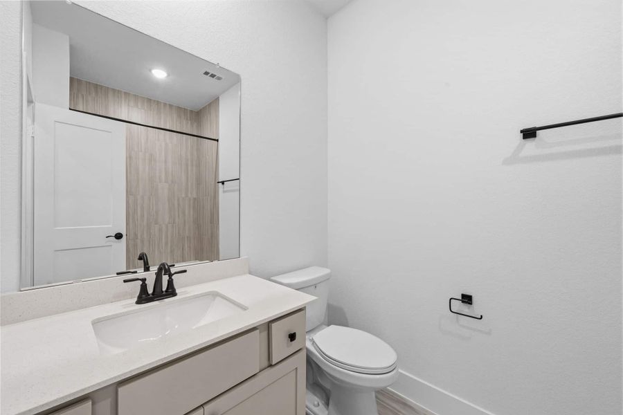 Furnished interior view inside a new home in Bridgeland, Cypress (Image 6).