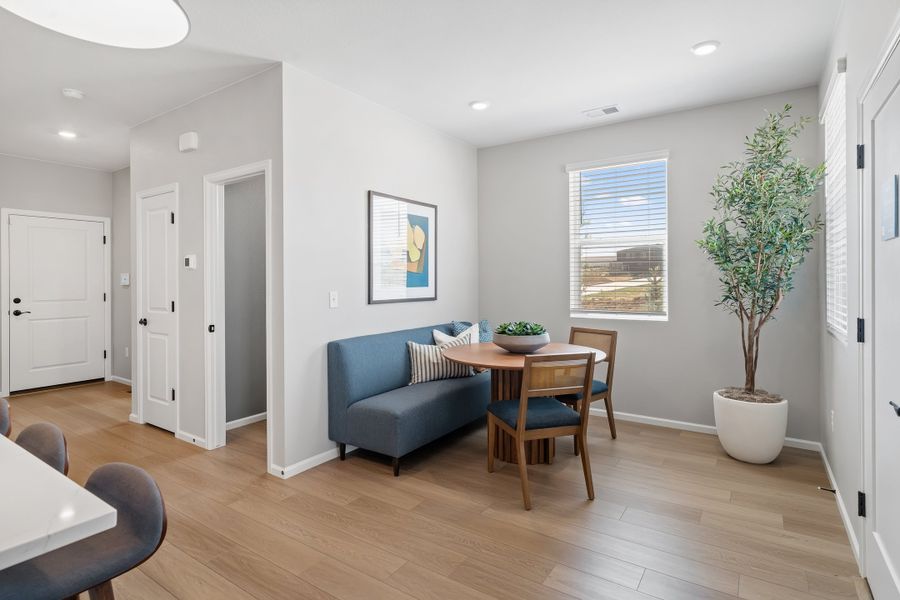 Representative furnished interior of a home built from the 2403 by Risewell Homes in Harvest Crossing, Aurora (Image 10).