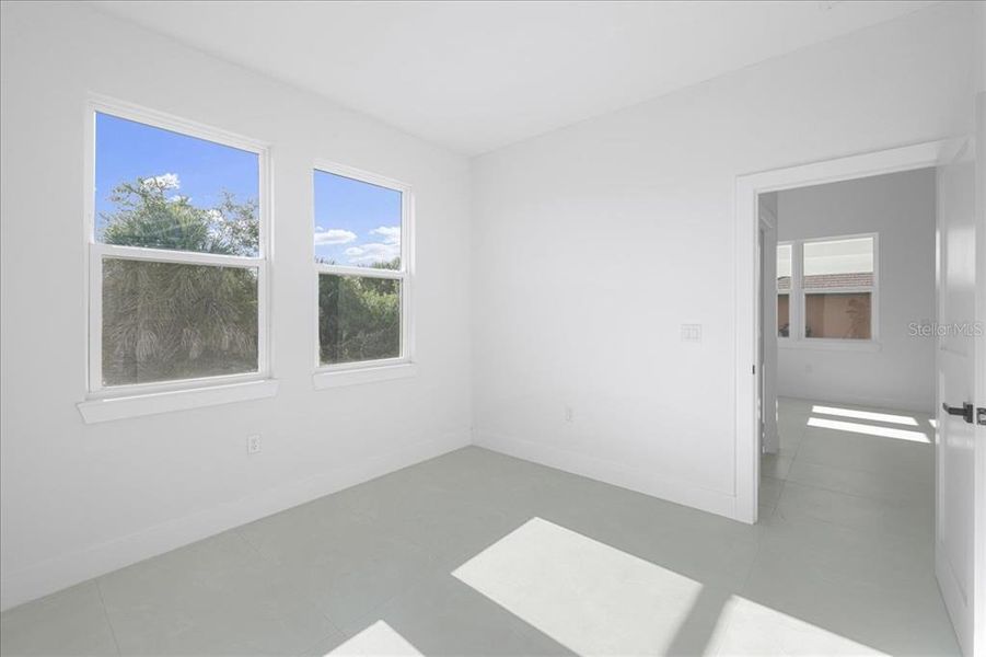 Spacious, unfurnished interior of a new home in , Port Charlotte (Image 24).