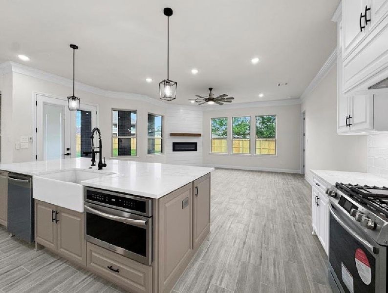Similar Kitchen island in a Home Built by TX Best Home Builders Similar Kitchen island in a Home Built by TX Best Home Builders