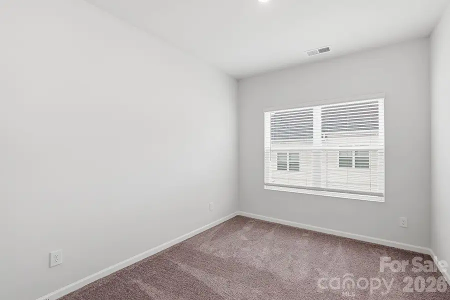 Spacious, unfurnished interior of a new home in Sloan Station, Charlotte (Image 11).