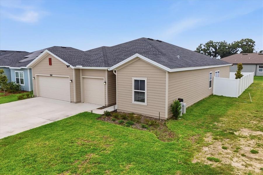 Front exterior of a new home in , Ocala, FL, highlighting curb appeal (Image 25).