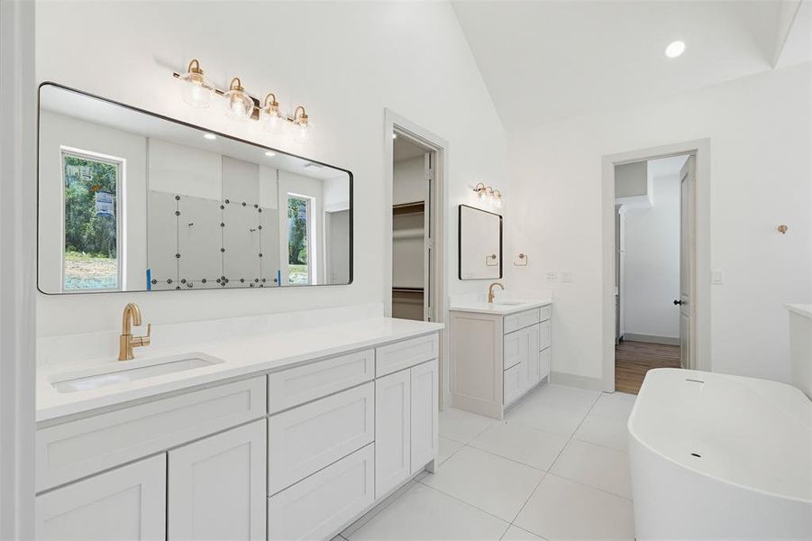Primary bathroom with separate vanities Primary bathroom with separate vanities