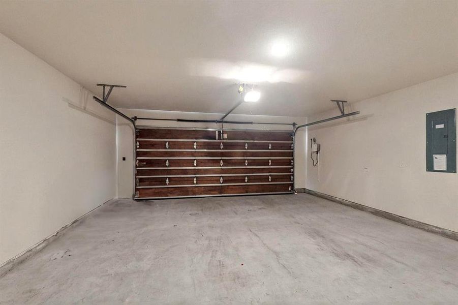 Garage featuring electric panel