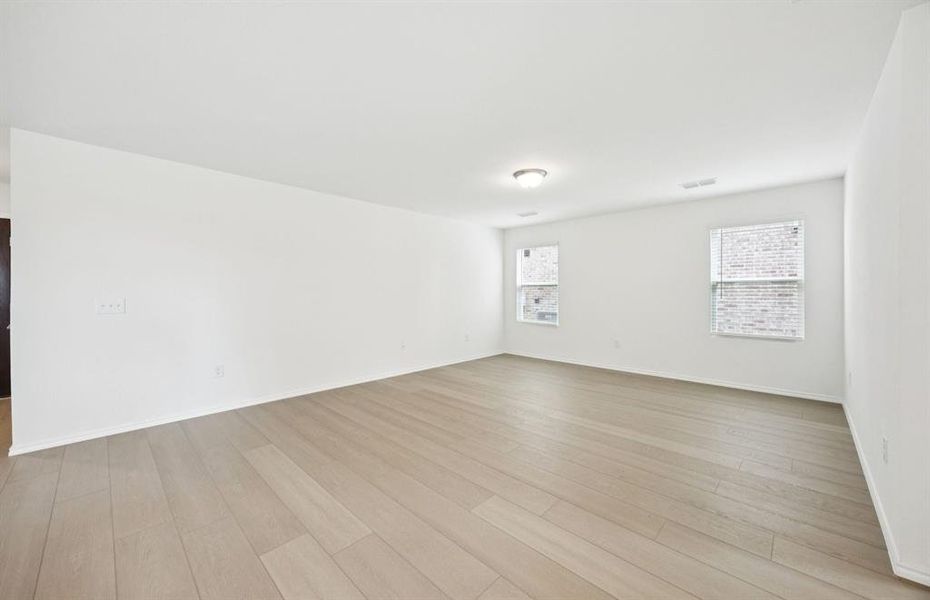 Spacious gathering room with large windows