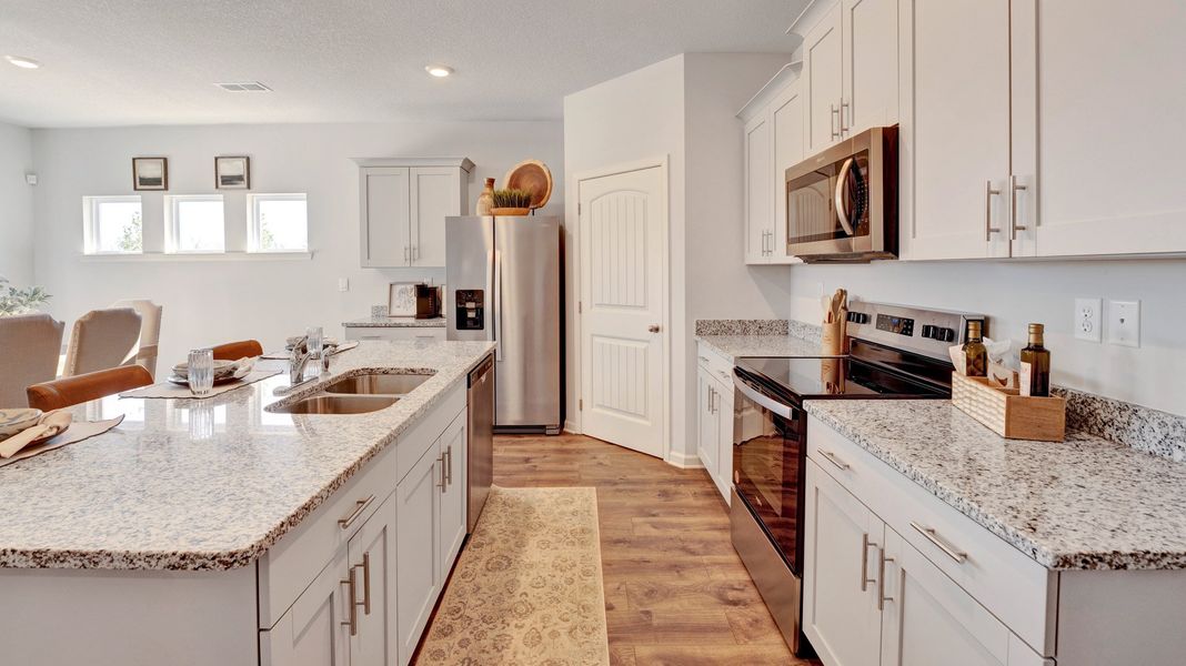 Furnished interior view inside a new home in The Orchard, Millington (Image 9).