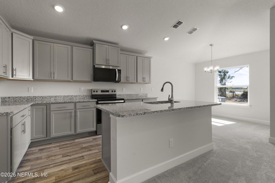 Furnished interior view inside a new home in Shadow Crest at Rolling Hills, Green Cove Springs (Image 6).