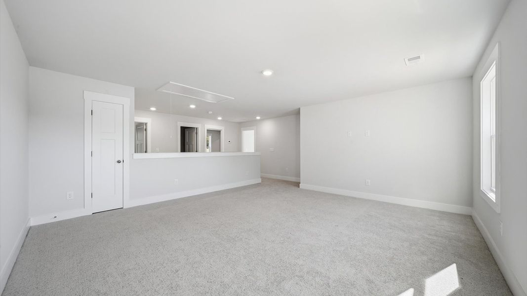 Refined loft with comfortable carpeted flooring and tasteful design throughout near Downtown Anderson