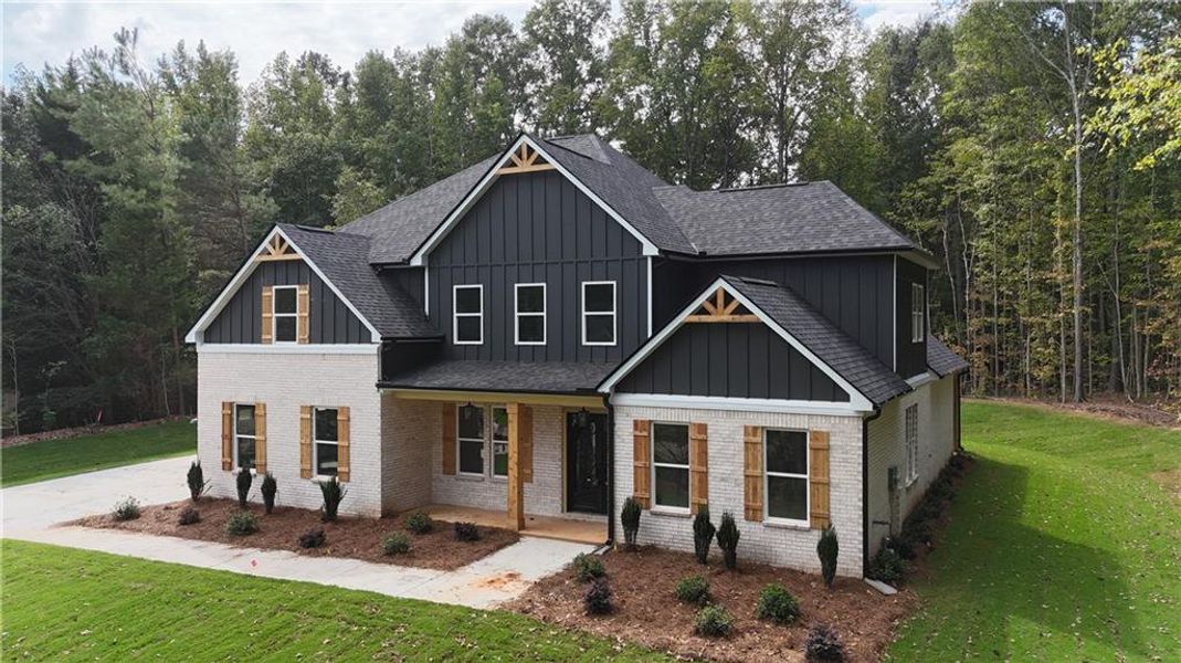Front exterior of a new home in , Monroe, GA, highlighting curb appeal (Image 11). Front exterior of a new home in , Monroe, GA, highlighting curb appeal (Image 11).