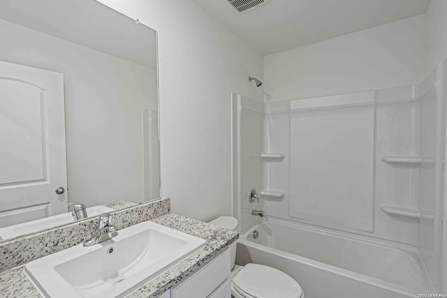 Furnished interior view inside a new home in Savannah Place, San Antonio (Image 3).