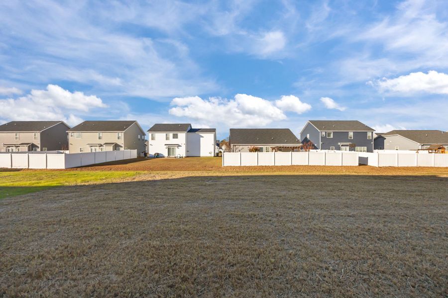 Exterior details and patio area of a home in Arbor Hills South II, Greenville (Image 27). Exterior details and patio area of a home in Arbor Hills South II, Greenville (Image 27).