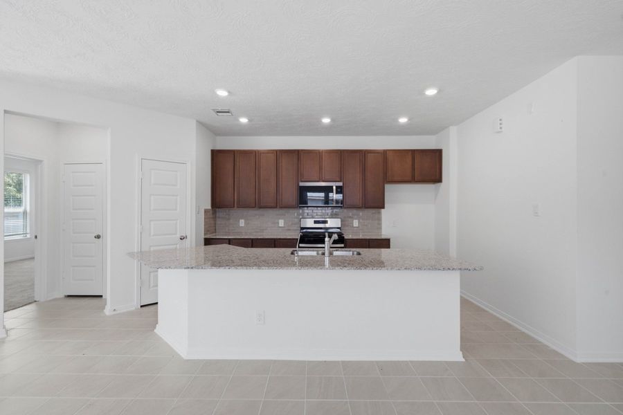 Furnished interior view inside a new home in Mustang Ridge, Magnolia (Image 5).