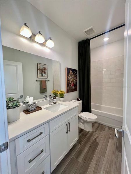 Furnished interior view inside a new home in Yucatan Gardens, Orlando (Image 8).